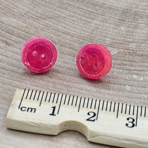 Boutons magenta - Boucles d'oreilles *brille dans le noir*